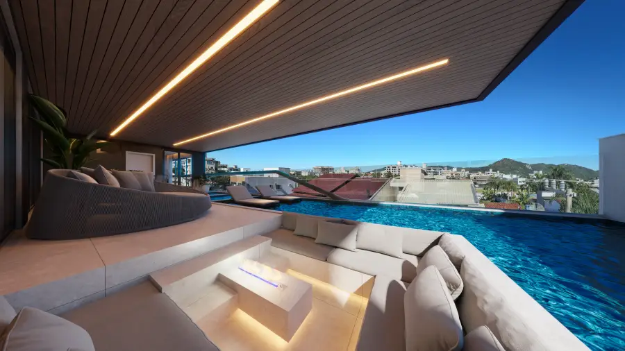 Lounge com lareira junto à piscina